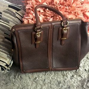 Dark brown colored tote bag.